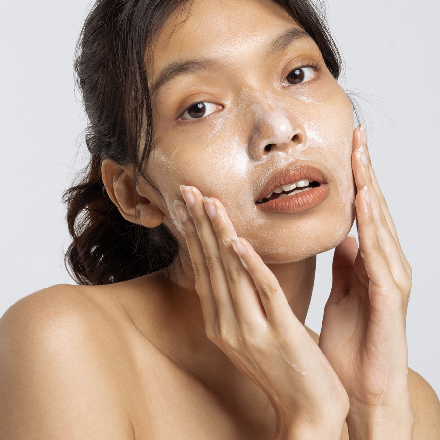 Portrait of Woman Washing Face