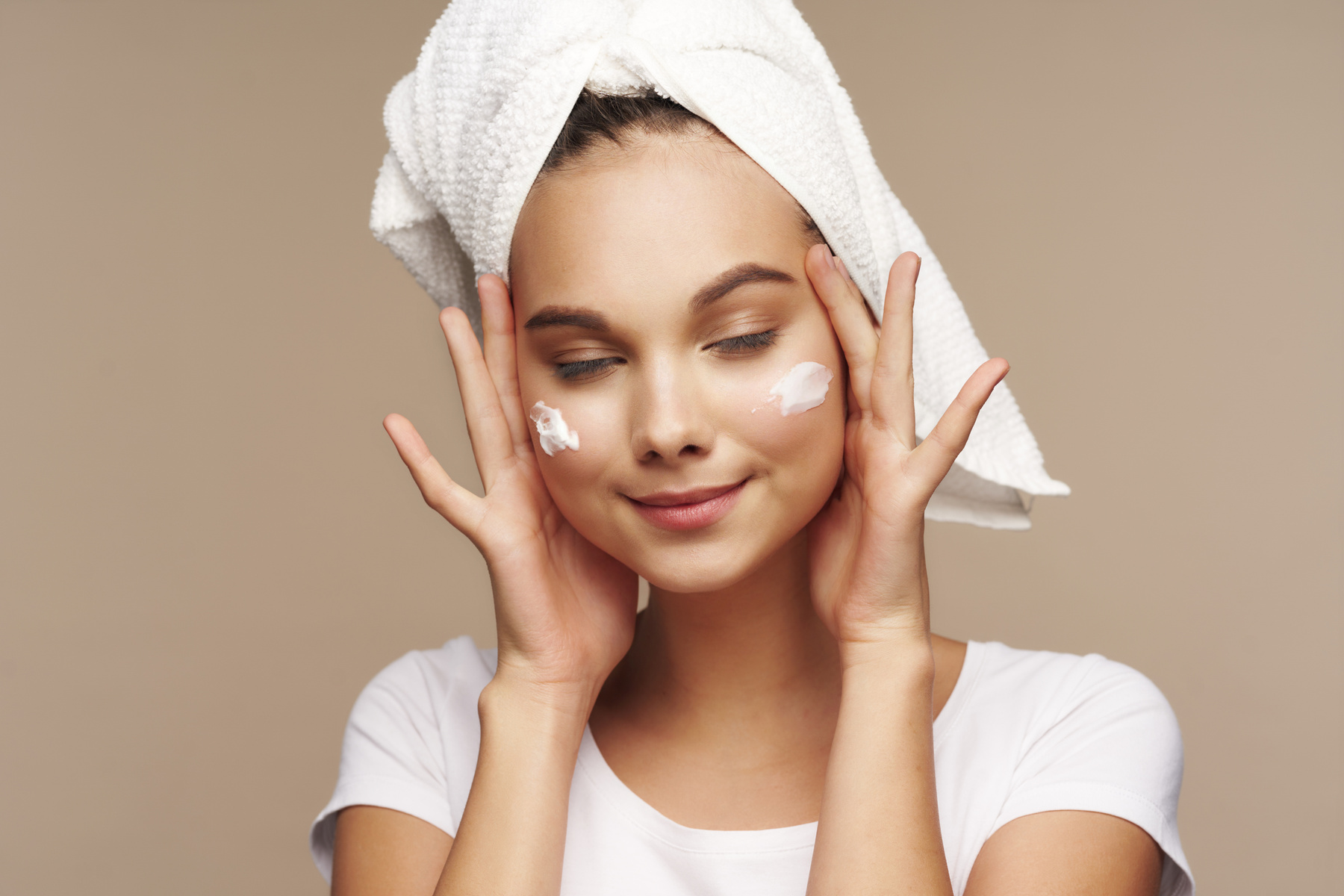 Girl with a Towel on Her Head Clean Skin Moisturizing Makeup Health